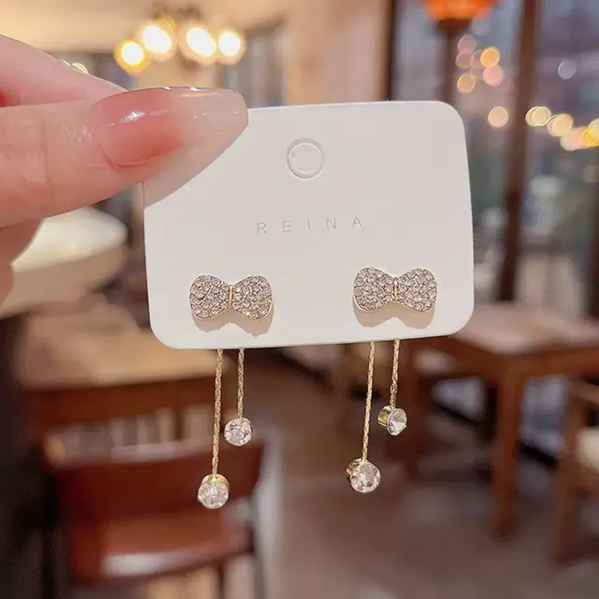 Golden Elegant Crystal Bow With Dangling Tassels