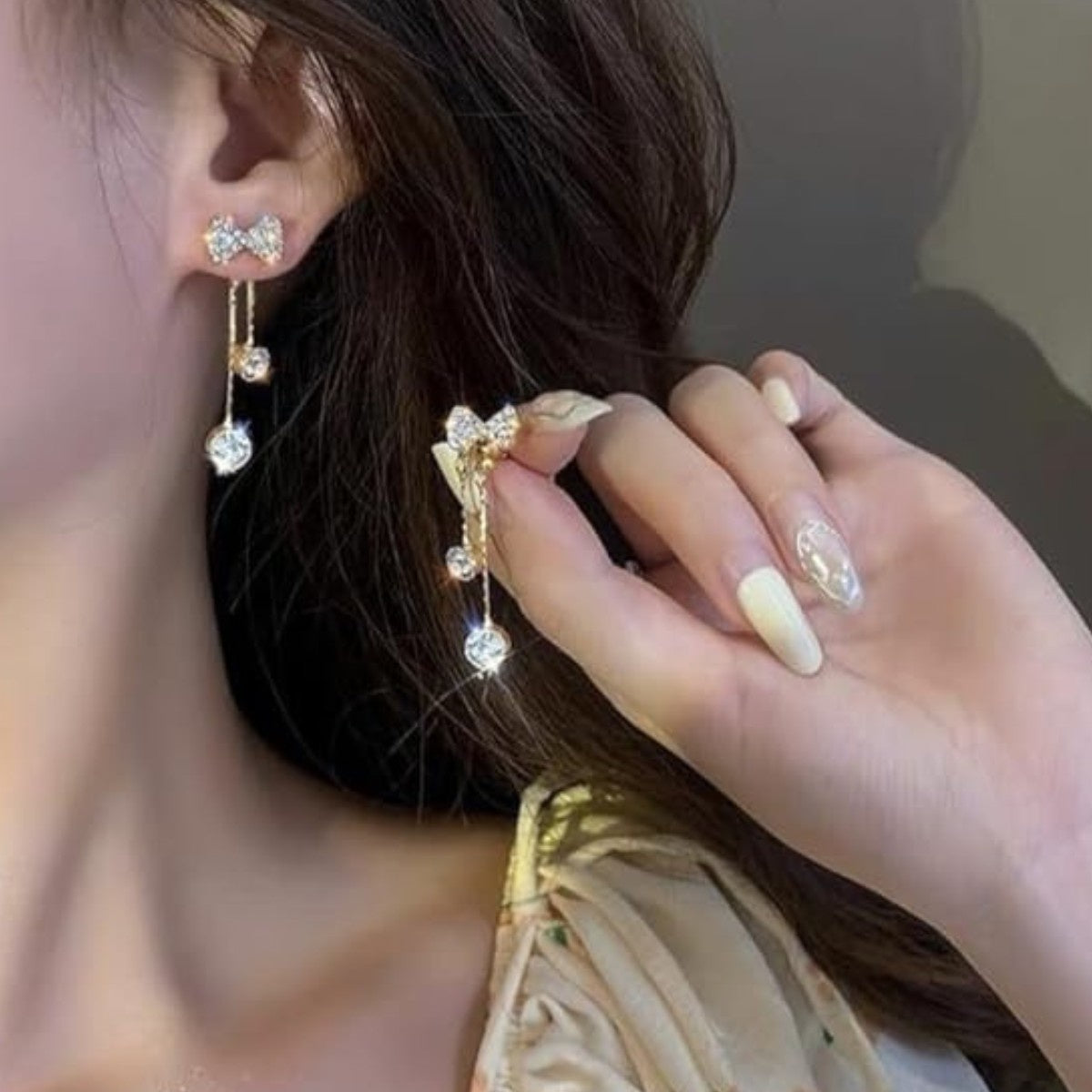 Golden Elegant Crystal Bow With Dangling Tassels