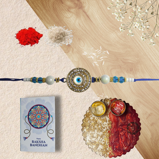 Evil Eye Rakhi with Roli Chawal, Raksha Bandhan Card & Artistic Resin Thali